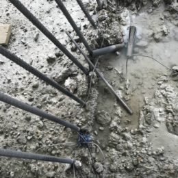 Exposed rebar with the bolts removed.