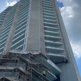 Painting and coating removal of a high rise in Miami using 40K equipment and tools.