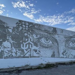 artist uses hydroblasted surface to add dimension to mural